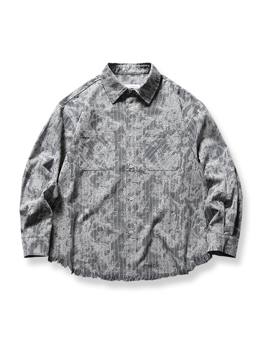 タイダイチェック柄とフリンジ裾が特徴的なリラックスフィットの長袖シャツ