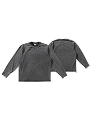 製品画像: インディゴウォッシュのヴィンテージ風長袖Tシャツの正面展示
詳細画像: Tシャツの襟元と袖口の三角カットディテールのクローズアップ