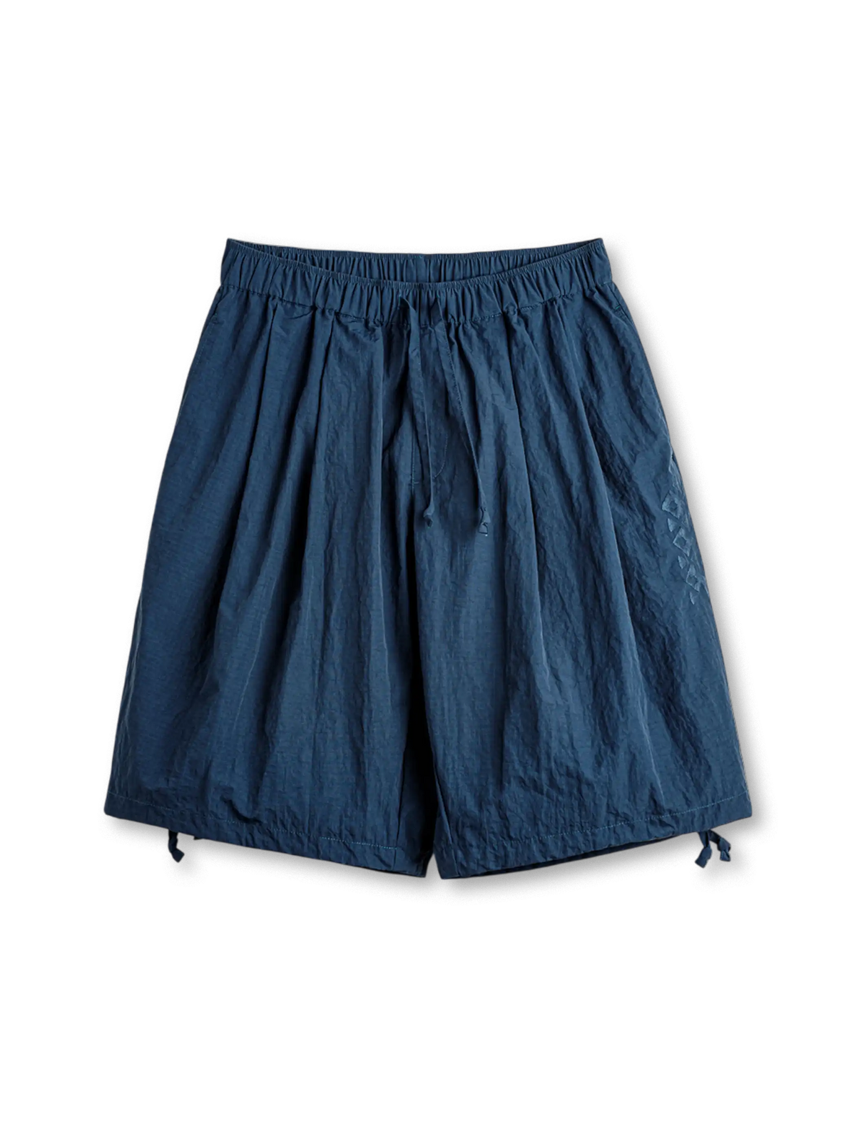 ナバホ刺繍が映える深海ブルーのドローストリングショーツ