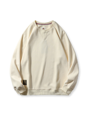 350gミルクシルク複合素材と起毛パイル裏地、リブ仕様が特徴のルーズフィットクルーネックスウェットの全体像。