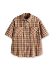 ヴィンテージウォッシュ加工を施した英国クラシックチェックの五分袖シャツ、斜めフラップポケット付き