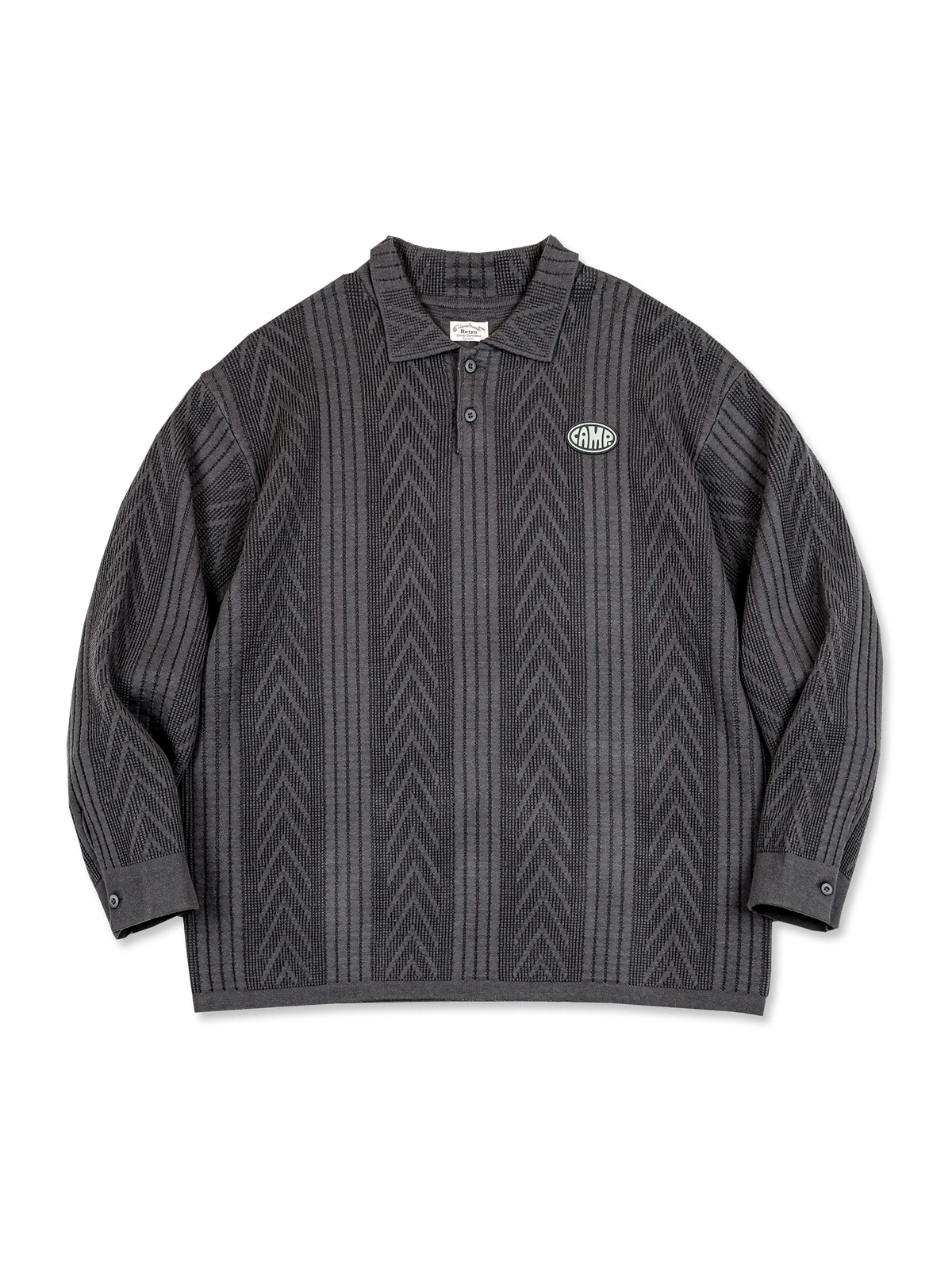 ストライプとアローパターンのジャカード織りを用いた800g超ヘビーウェイトニットのヴィンテージポロシャツ。ルーズフィットで動きやすく、アカデミックスタイルに最適。