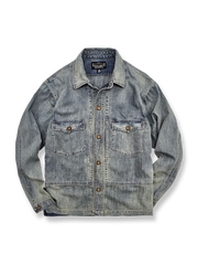 黄銅製メタルボタンとネイビーポプリン素材、リブ袖口が特徴のヴィンテージデッキジャケットの全体像。