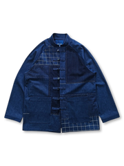 デニムとインディゴ手織り布のパッチワークが特徴のヴィンテージウォッシュジャケット