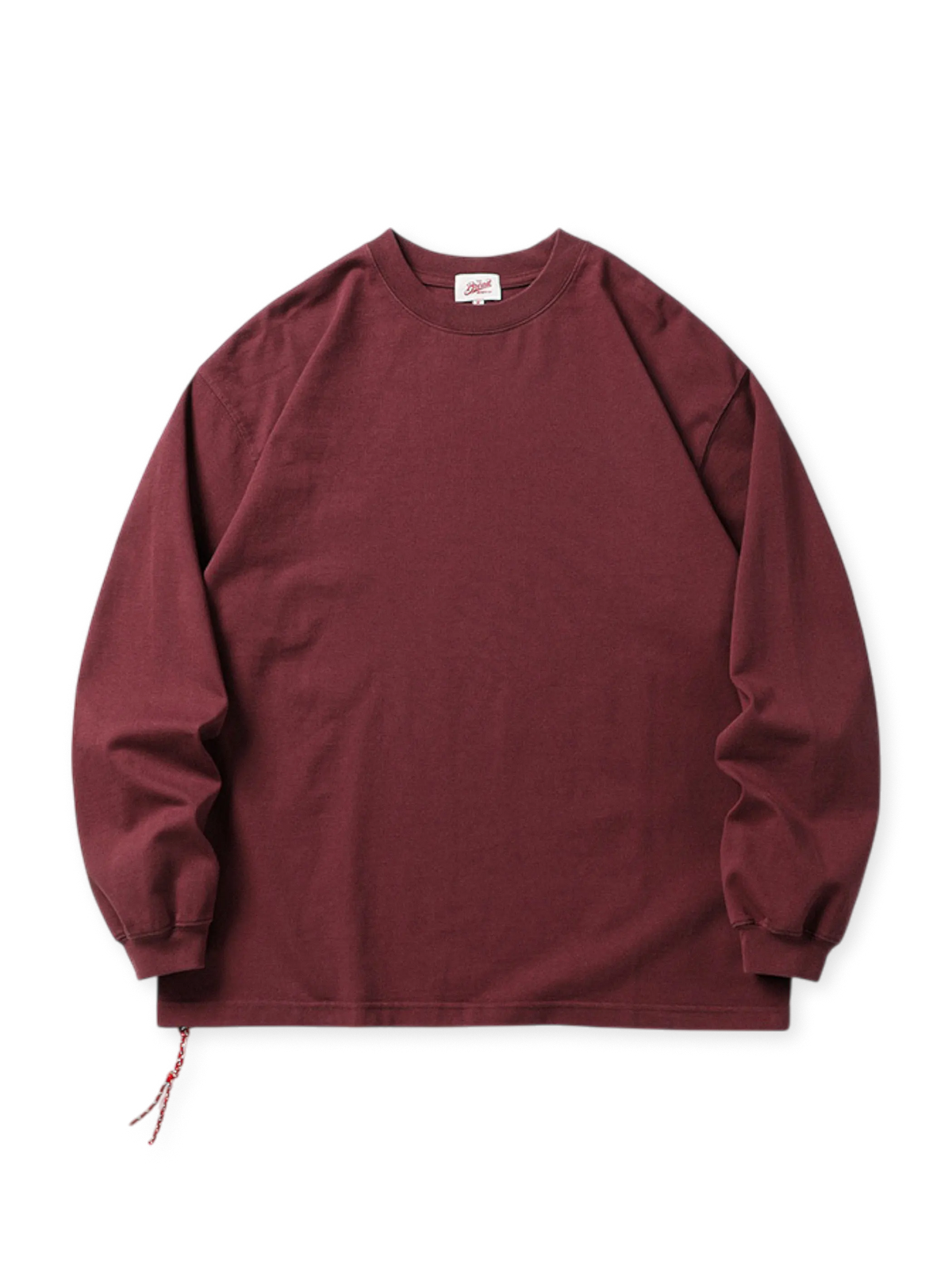 320gヘビーコットン素材を使用し、ヴィンテージウォッシュ加工が施されたルーズシルエットのロングスリーブTシャツ。