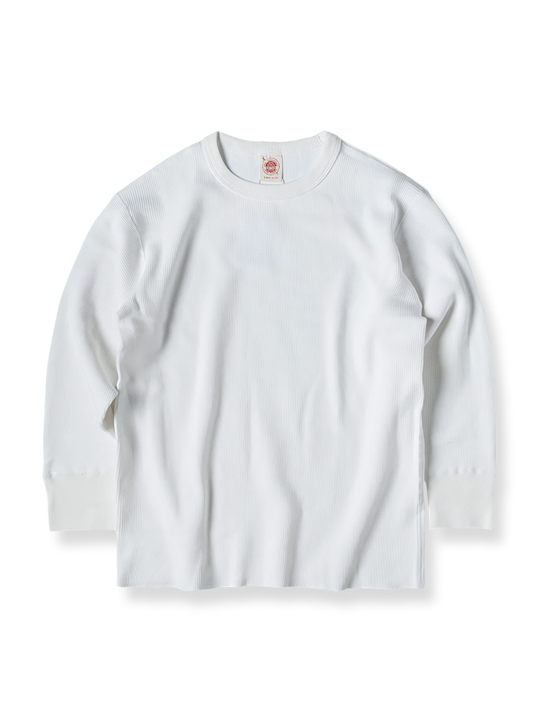 厚手ワッフル格子柄の長袖クルーネックTシャツ。