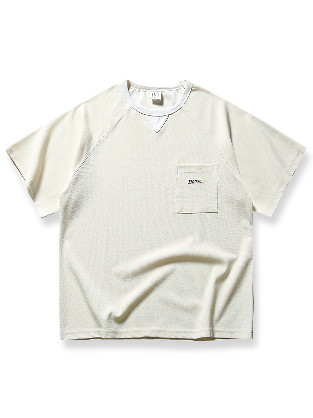 ワッフル地のテクスチャーとパッチポケットをあしらったヴィンテージ風半袖Tシャツ。
