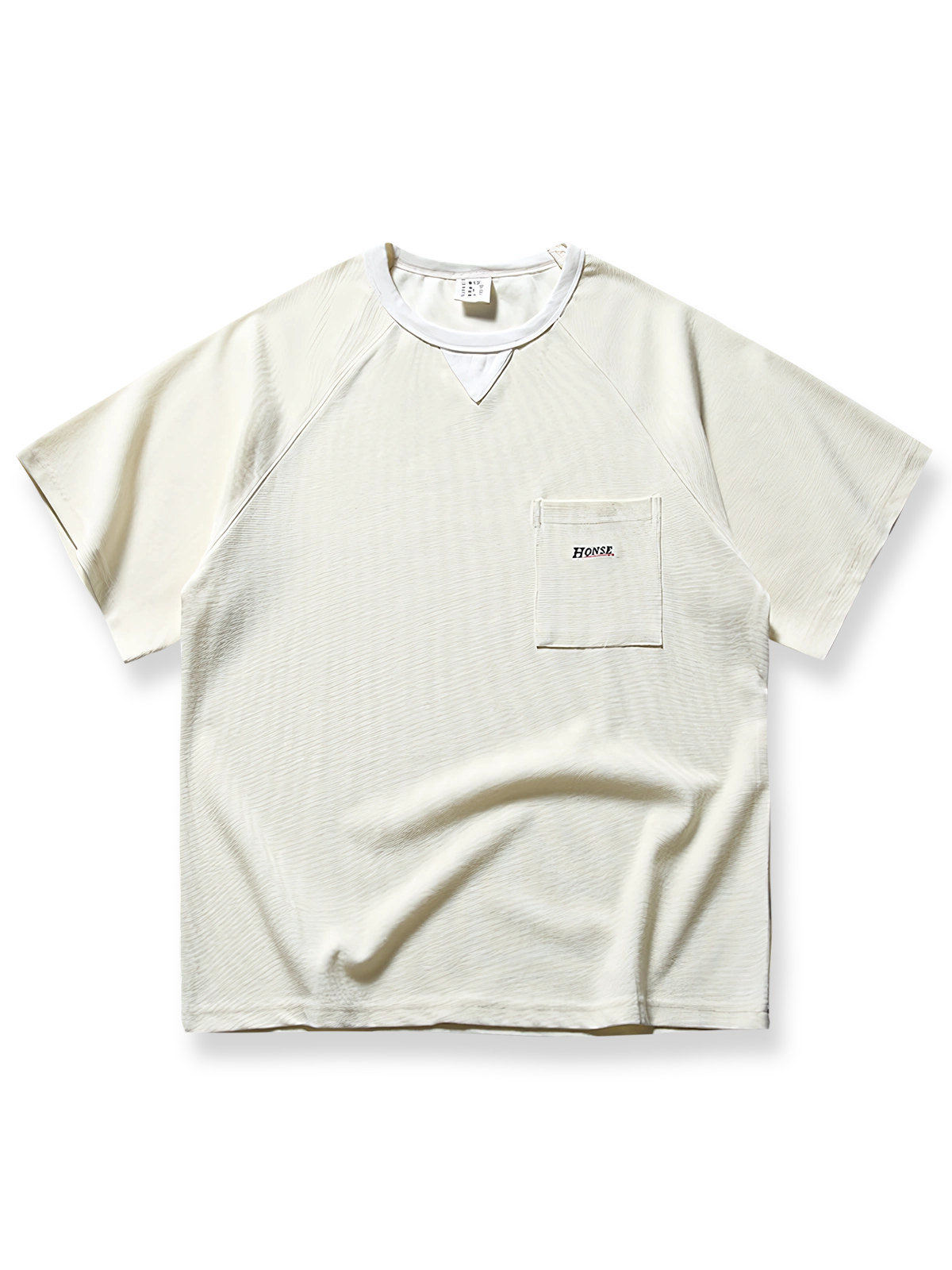 ワッフル地のテクスチャーとパッチポケットをあしらったヴィンテージ風半袖Tシャツ。