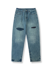 ヴィンテージ風ウォッシュド加工とダメージディテールが際立つコットンデニムパンツ