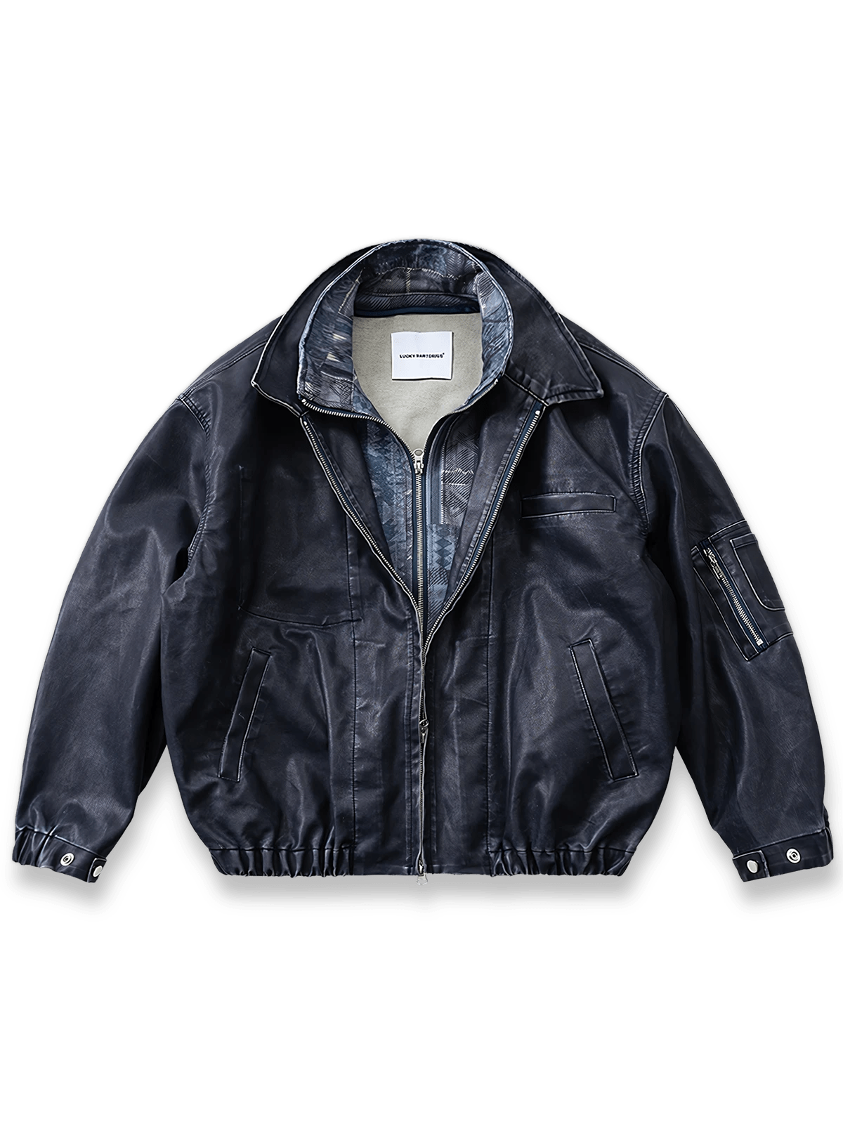 ウォッシュ加工PUレザーとエスニック柄裏地が特徴のダブルレイヤード風ジャケット。