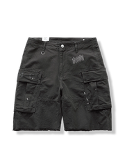 フリンジ裾とスプラッター柄が特徴の純綿素材ショートパンツ、ゆったりシルエットで快適な履き心地