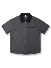 ウォッシュ加工スタンドカラー半袖シャツ。