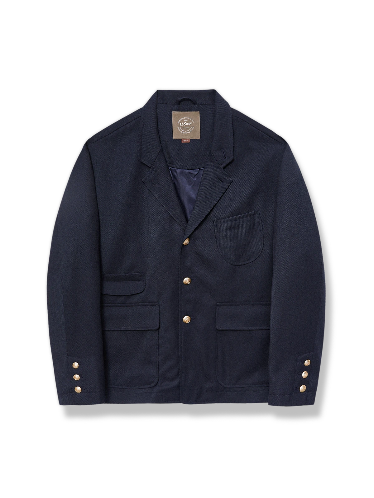 オーストラリア産メリノウール混紡ツイードと真鍮ボタンが上品なネイビーブルーのリラックスフィットジャケット。