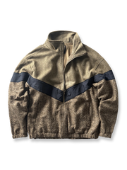 ウール混紡素材とジオメトリックパッチワークが特徴のレトロジャケット